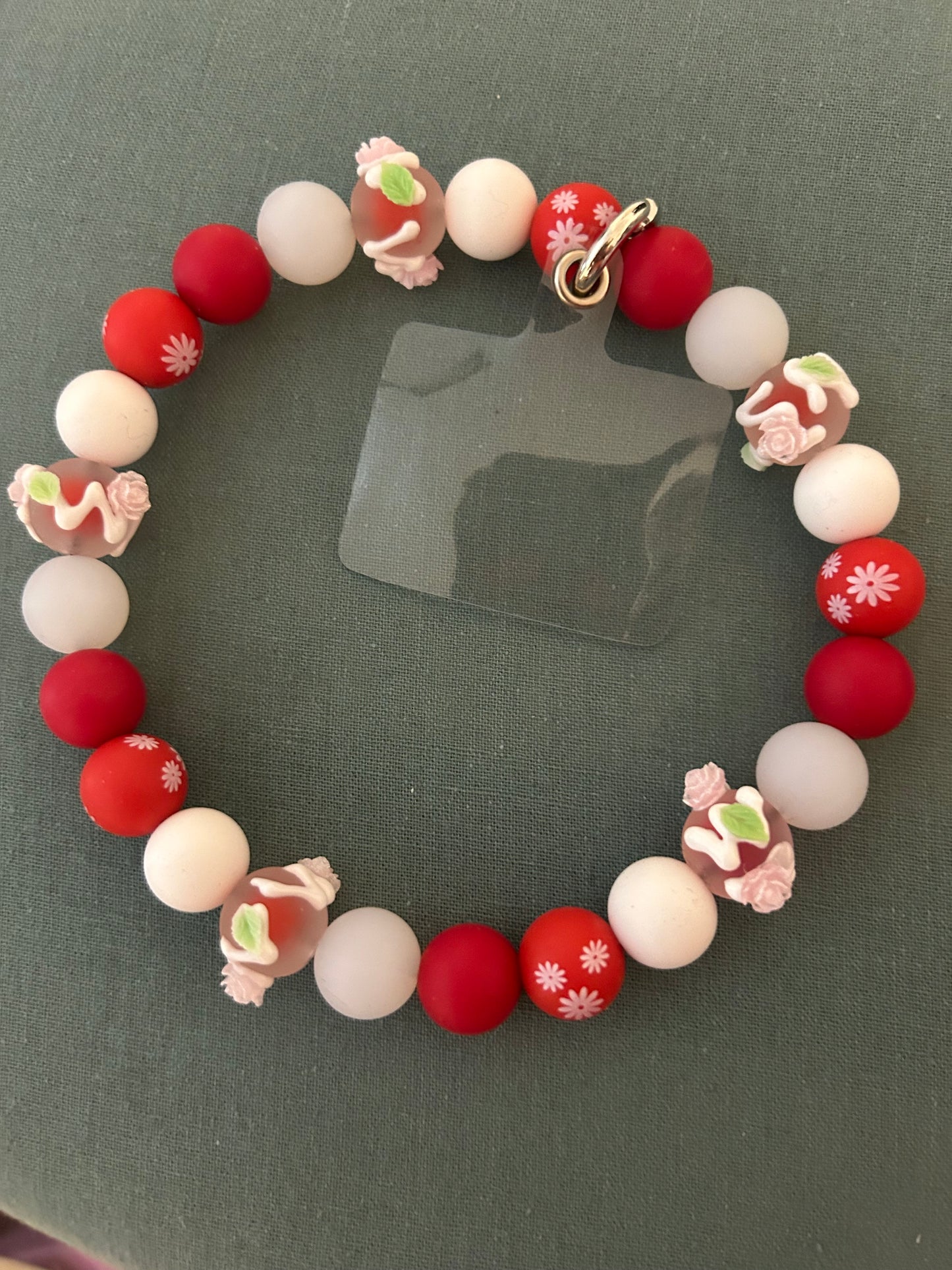 Phone Holders, Wristlets, Backpack & Locker Charms