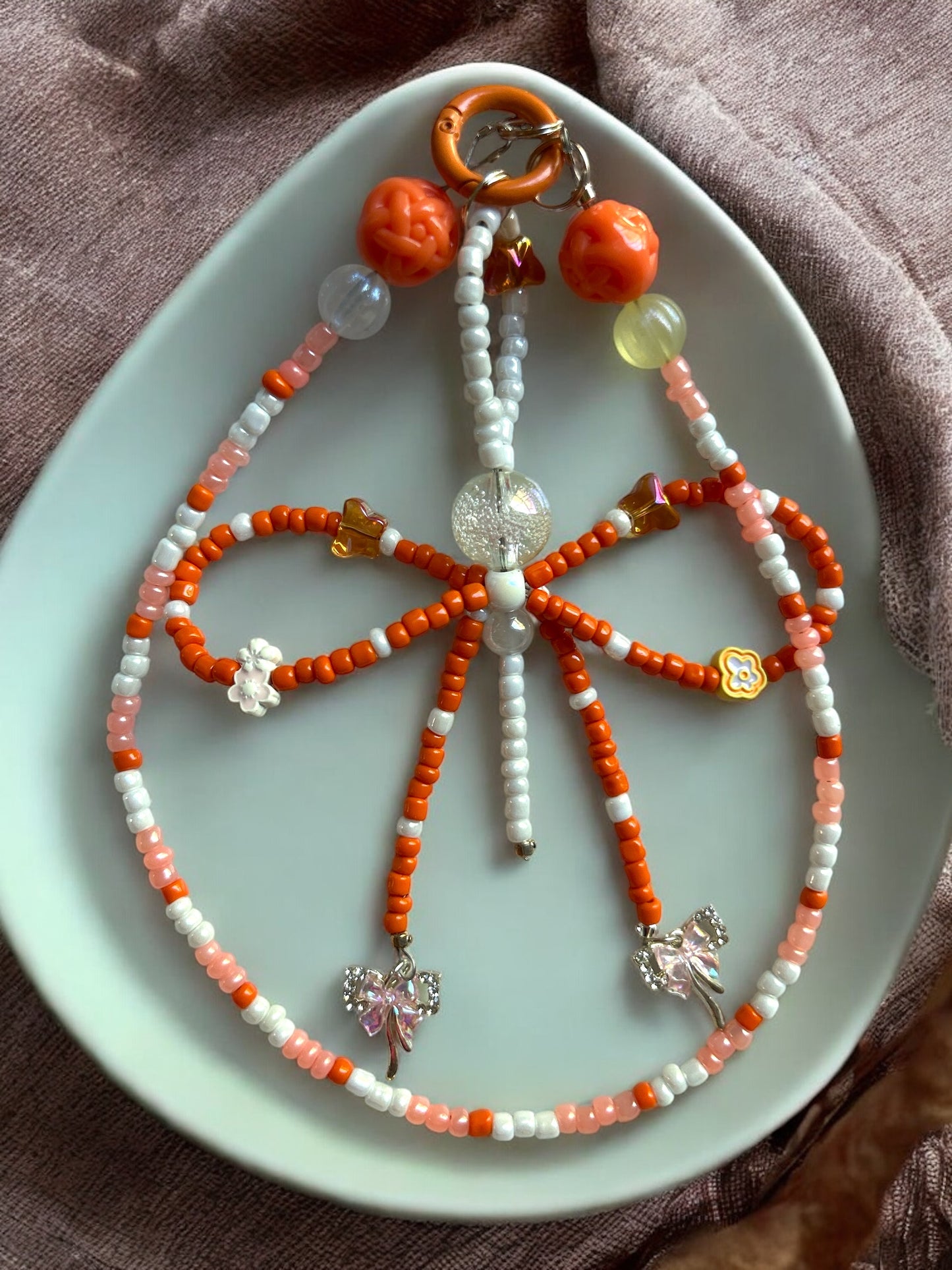 Phone Holders, Wristlets, Backpack & Locker Charms